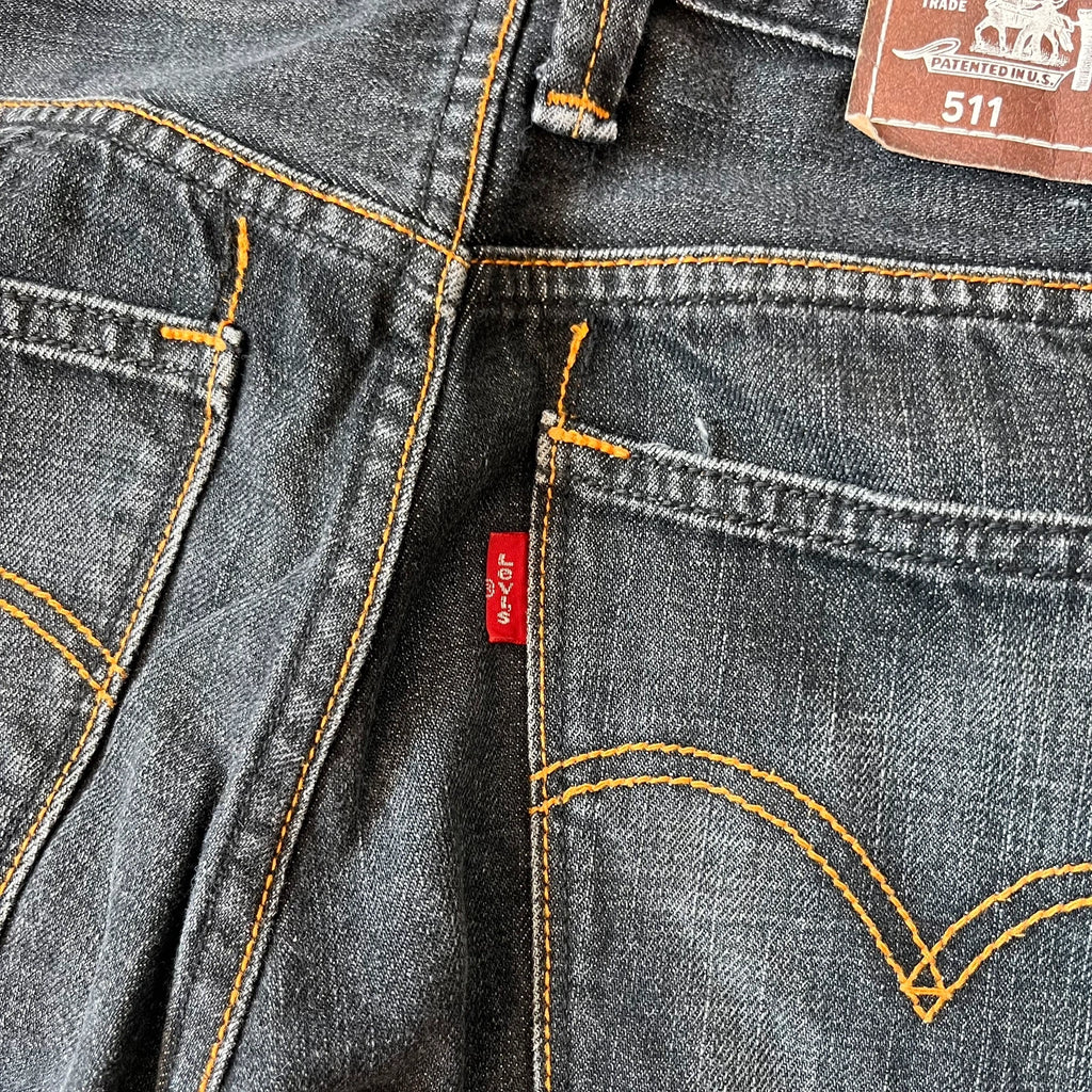 Vintage Levi's 511 Slim Jeans Herren W31 L32 Schwarz – Red Tab Detail