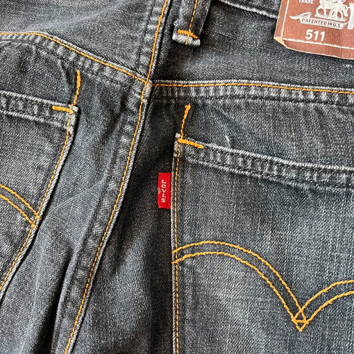 Vintage Levi's 511 Slim Jeans Herren W31 L32 Schwarz – Red Tab Detail