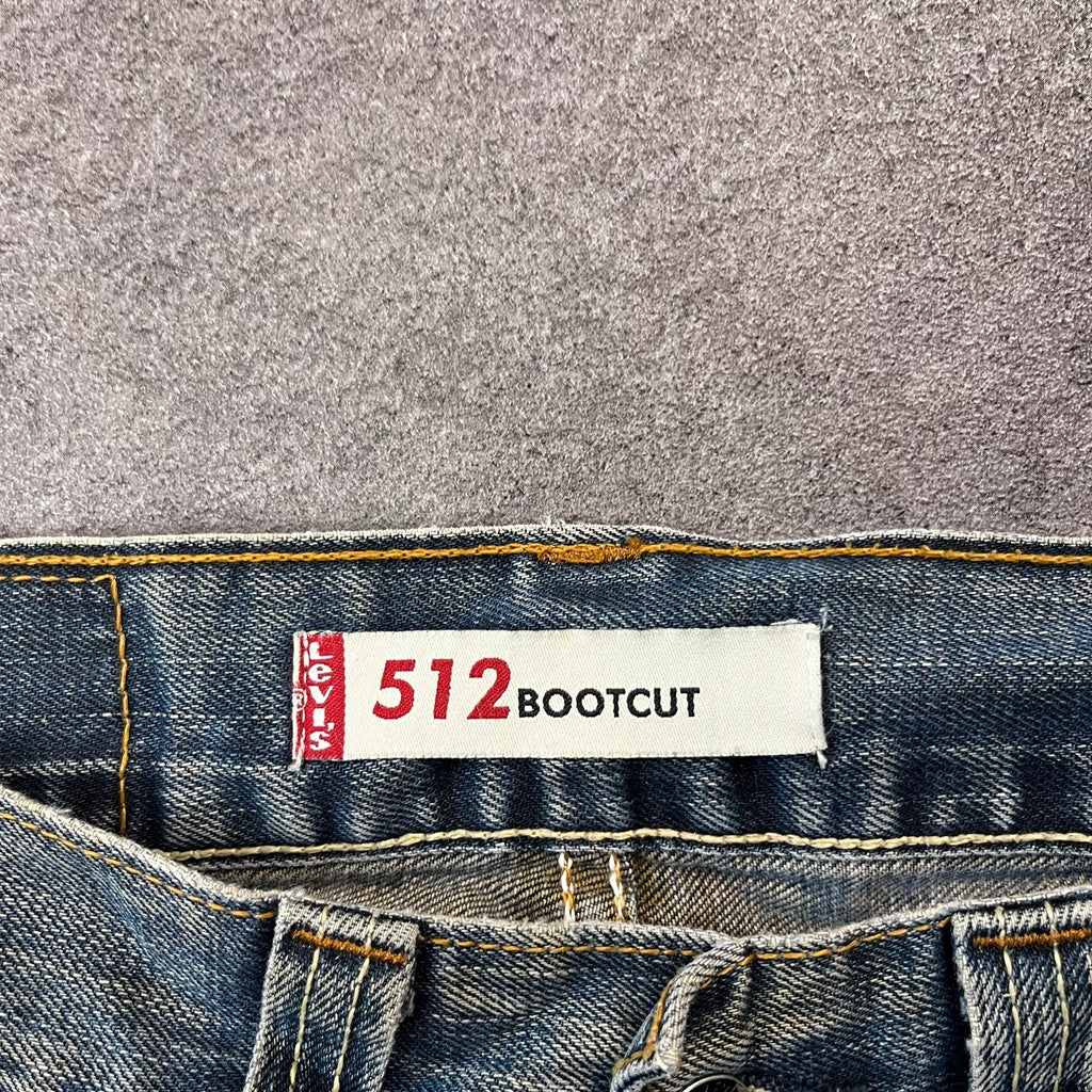 Vintage Levi's 512 Bootcut Jeans Herren W29 L32 Heavy Distressed Blau 2000s
