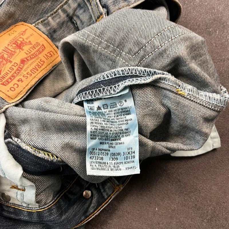 Vintage Levi's 512 Bootcut Jeans Herren W31 L32 Heavy Distressed Blau/Grau 2000s