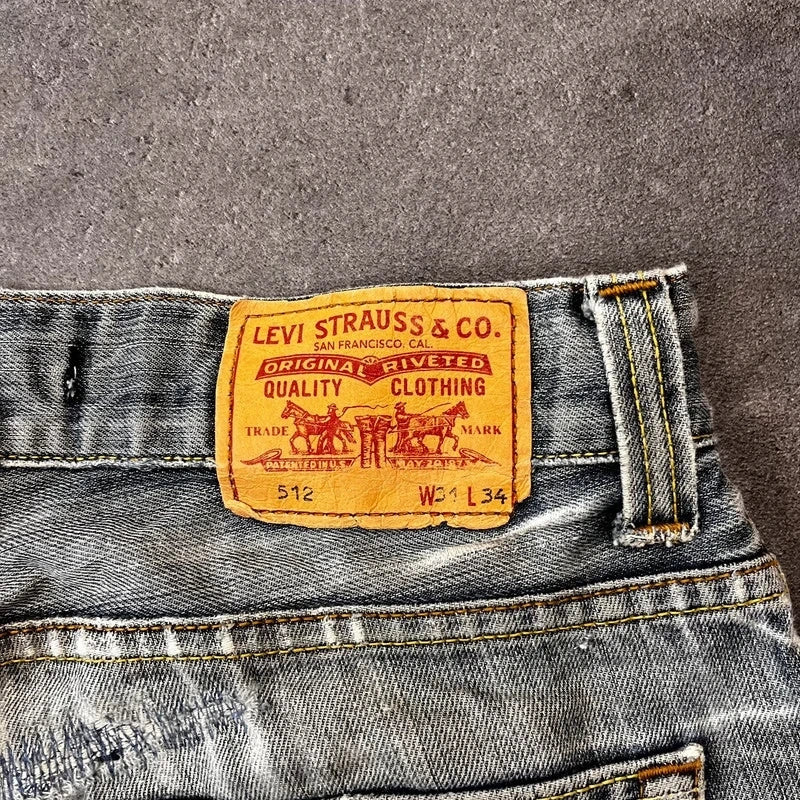 Vintage Levi's 512 Bootcut Jeans Herren W31 L32 Heavy Distressed Blau/Grau 2000s