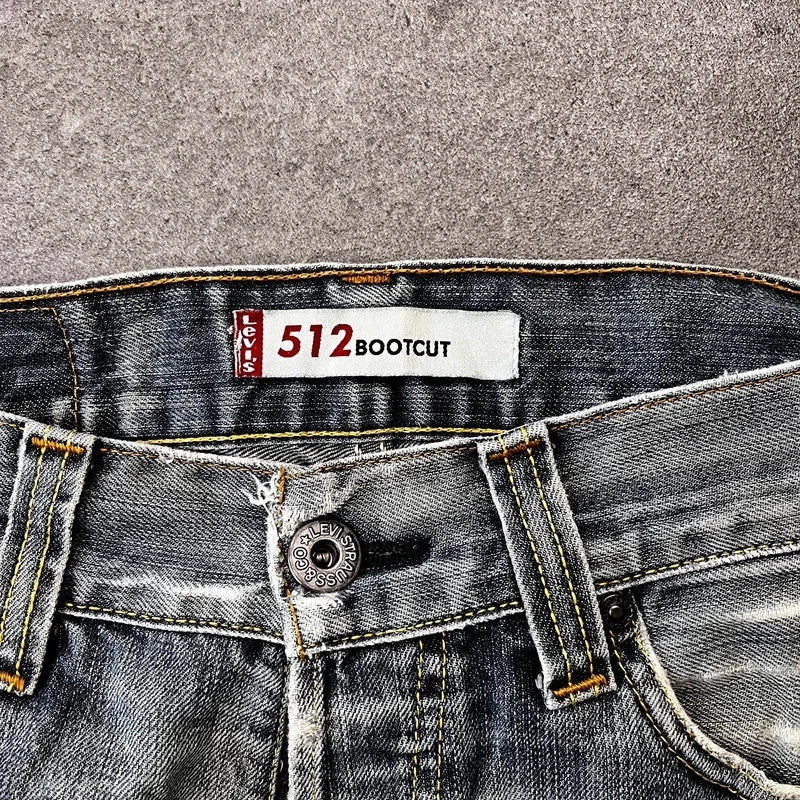 Vintage Levi's 512 Bootcut Jeans Herren W31 L32 Heavy Distressed Blau/Grau 2000s