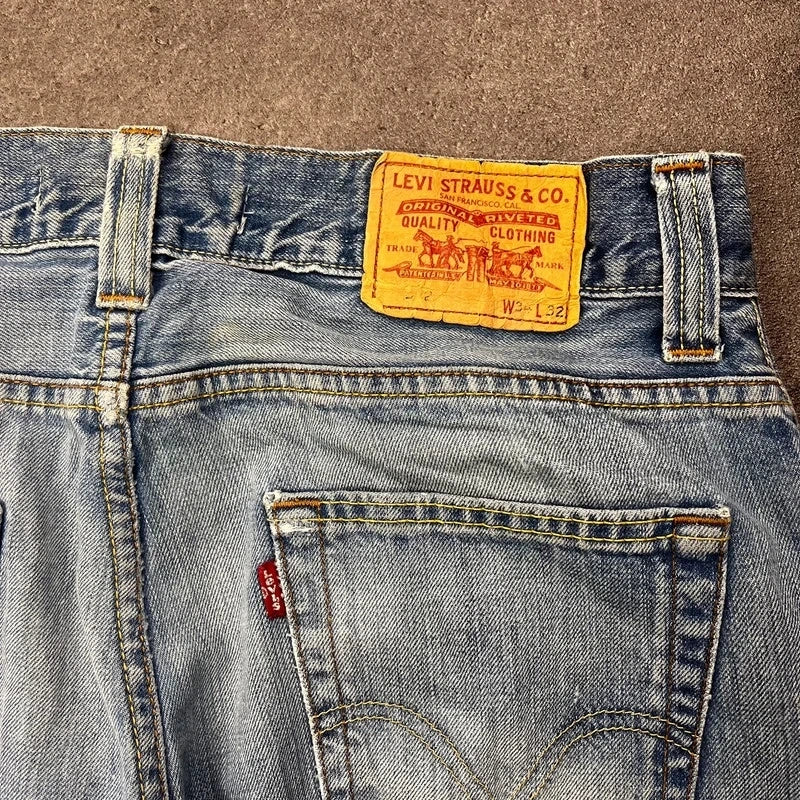 Vintage Levi's 512 Bootcut Jeans Herren W34 L32 Heavy Distressed Blau 2000s