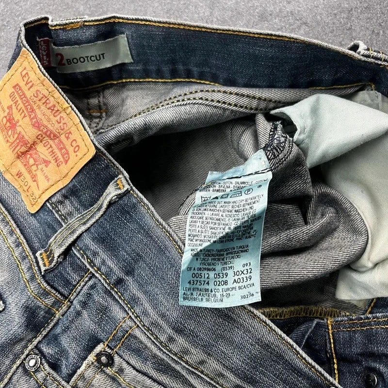 Vintage Levi's 512 Bootcut Jeans Herren W30 L32 Heavy Distressed Blau/Grau 2000s
