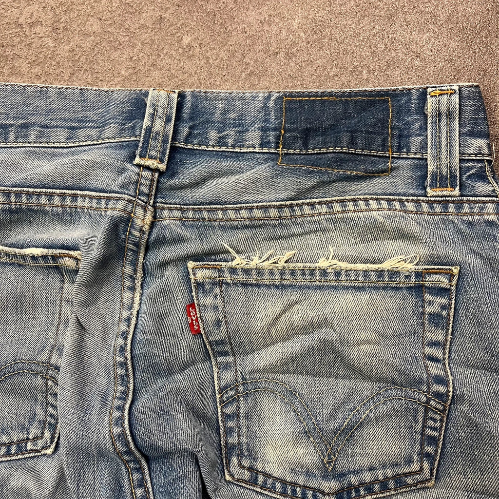 Vintage Levi's 512 Bootcut Jeans Herren W31 L36 Heavy Distressed Blau 2000s
