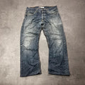 Vintage Levi's 512 Bootcut Jeans W34 L28 Dunkelblau Grau Washed