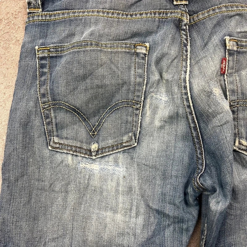 Vintage Levi's 512 Bootcut Jeans Herren W32 L32 Heavy Distressed Blau/Grau 2000s