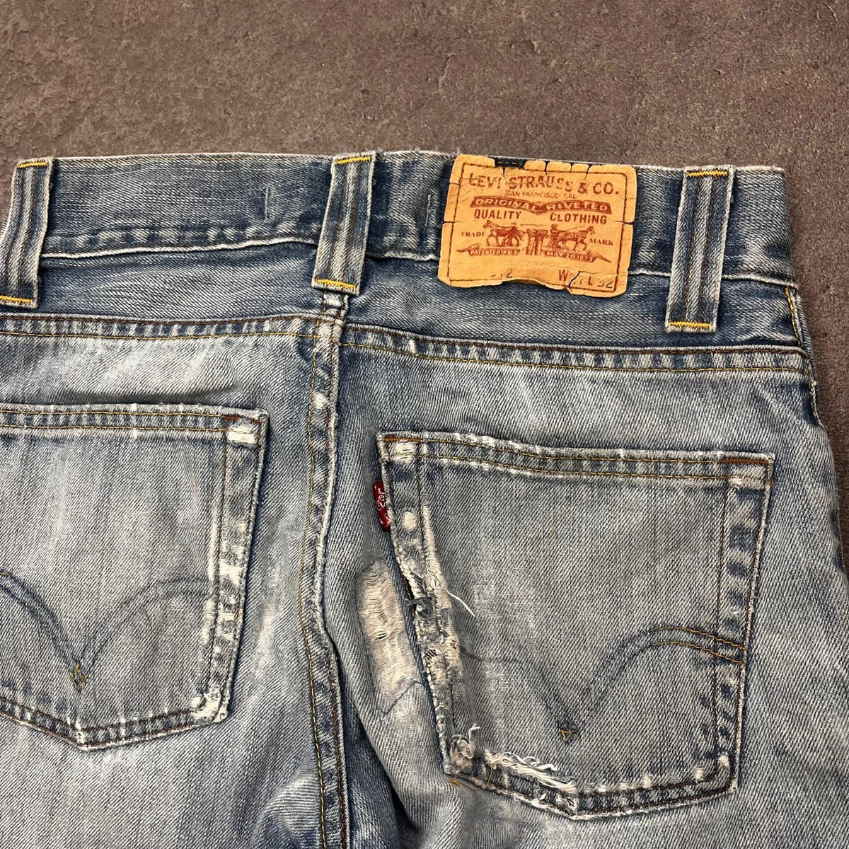 Vintage Levi's 512 Bootcut Jeans Herren W27 L28 Washed Distressed Hellblau 2000s